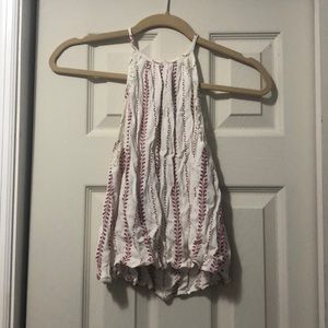 Red and white patterned tank